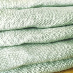 Macro de tissu de taie d'oreiller en lin vert clair